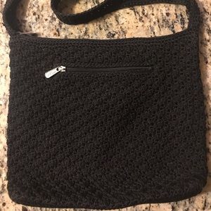 The SAK black crocheted purse